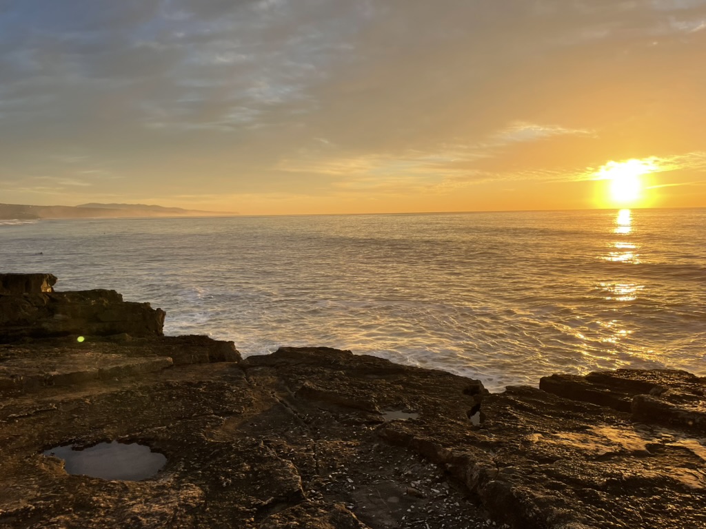 Sunset over the Atlantic and the rocky coastline